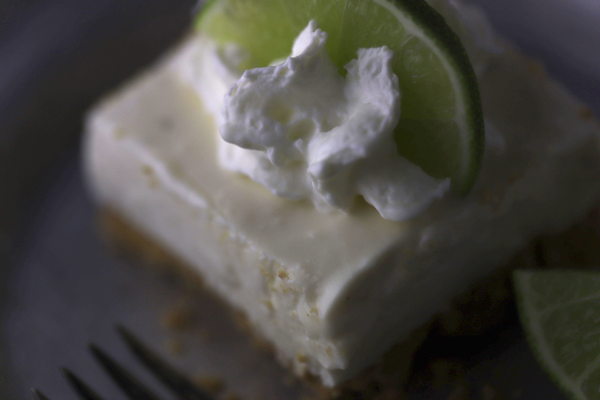 lime no bake cheesecake bar slice on a plate