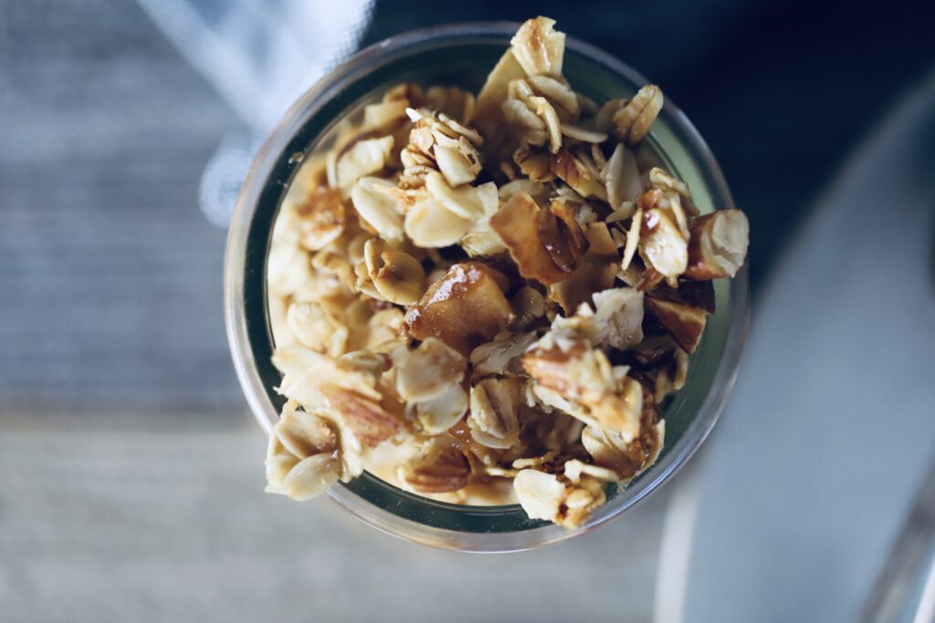 toasted coconut honey granola in a small glass jar