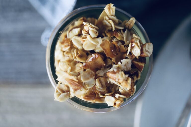 toasted coconut honey granola in a small glass jar