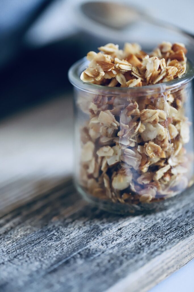 toasted coconut honey granola in a small glass jar