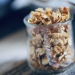 toasted coconut honey granola in a small glass jar