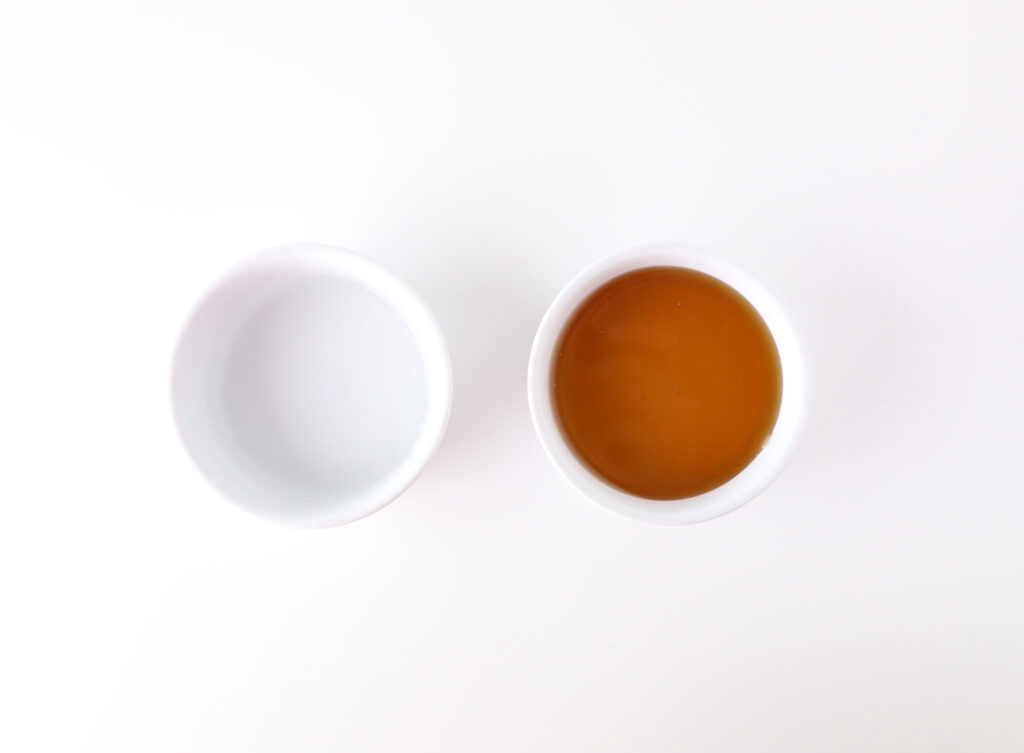 Water and honey in glass bowls