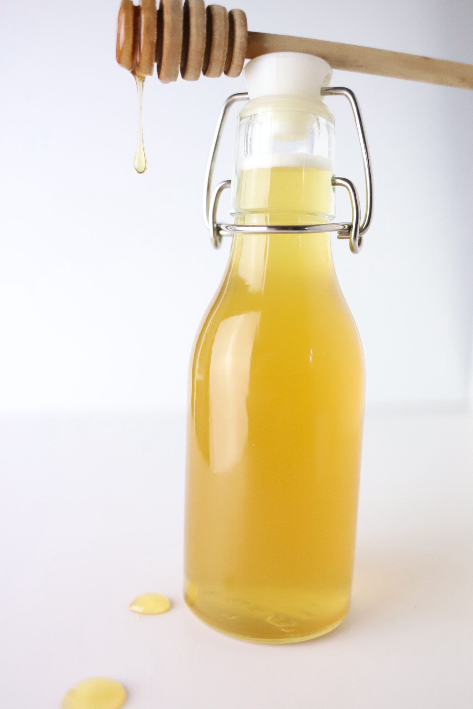 honey simple syrup in a glass jar