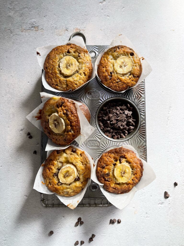 Chocolate Chip Banana Muffins in a muffin pan