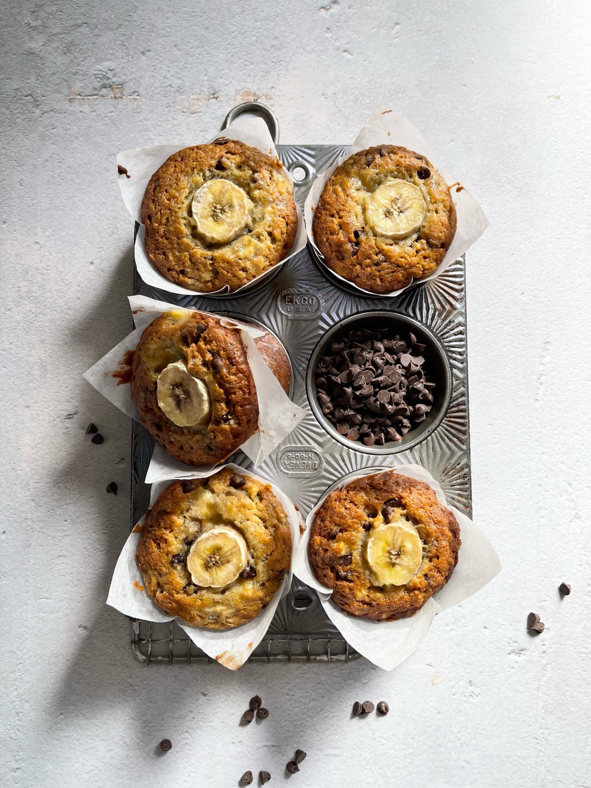 Chocolate Chip Banana Muffins in a muffin pan